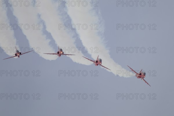 BAE Systems Hawk four aircraft of the RAF Royal air force Red Arrows display team flying, England,