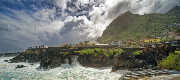 High waves on the rocks of Porto Moniz, surf on the Atlantic Ocean, storm, clouds, Porto Moniz,