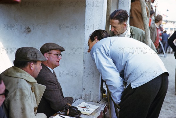 Time keepers with stop watches Nürburgring race track 1000 Kilometres 28 May 1961, Bill de