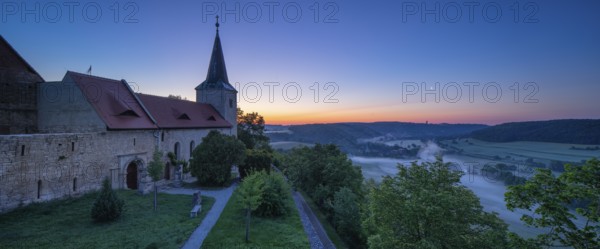 Monastery church Zscheiplitz at sunrise, morning fog in the Unstrut valley, Freyburg,
