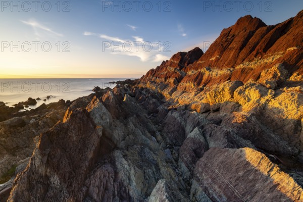 Colourful rocks on the coast, Varanger, Barents Sea, Finnmark, Norway, Europe