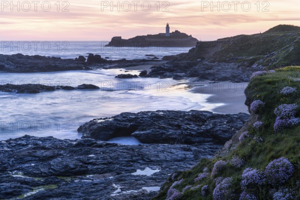 Godrevy Lighthouse, the lighthouse of Godrevy on Godrevy Island in the sea. In the evening at
