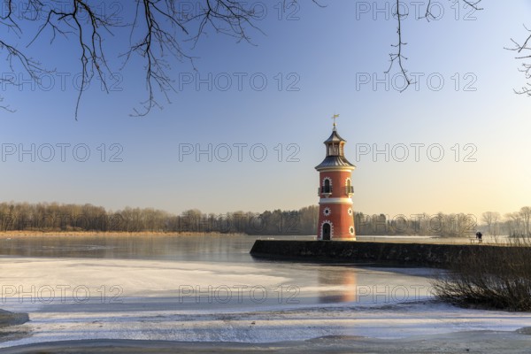 Pier with lighthouse on the large pond near the Fasanenschlößchen, Moritzburg, Saxony, Germany,