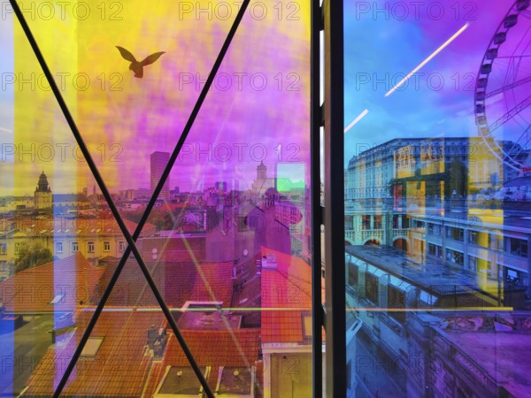 Marollescenece, art installation The Cube, coating of the windows with translucent dichroic films,