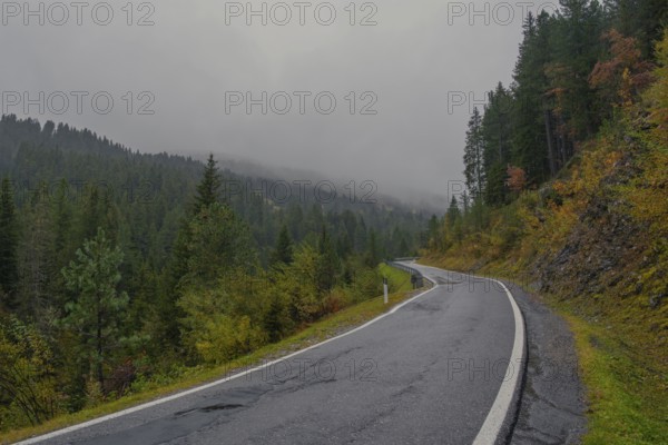 Typical road (Coller Strasse) in the Dolomites near rain, Passo delle Erbe, Würzjoch, St.