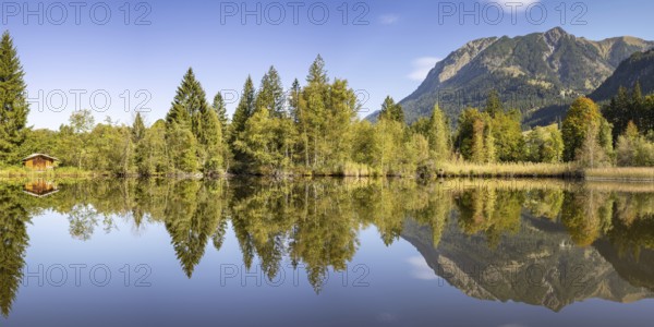 Rubihorn, 1957m, Gaisalphorn, 1953m, and Schattenberg, 1845m, water reflection in the moor pond,