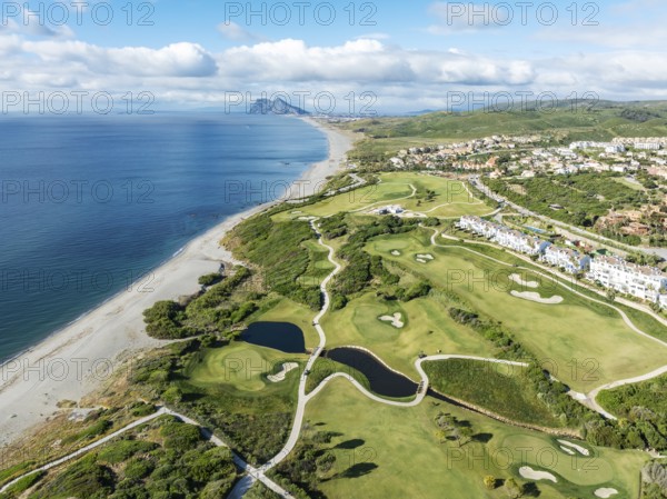 The La Hacienda Links Golf Resort at the Mediterranean Sea with the Rock of Gibraltar (British) in