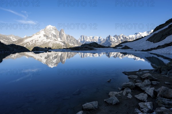 Mountain landscape in the evening light, water reflection in Lac Blanc, mountain peak, Aiguille