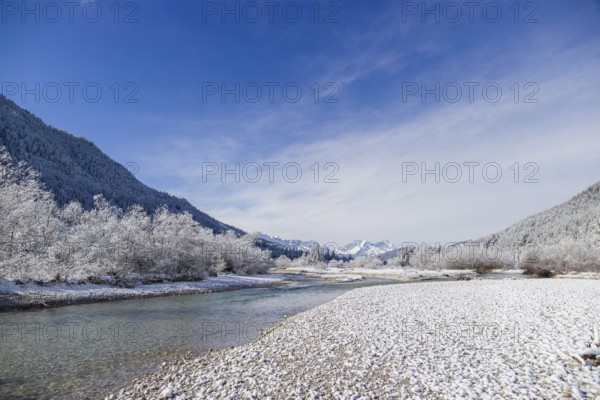 Isar valley in winter at temperatures of minus 18 degrees Celsius. Snow covered landscape with the