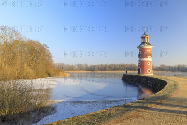 Pier with lighthouse on the large pond near the Fasanenschlößchen, Moritzburg, Saxony, Germany,