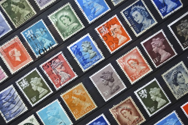 Old postage stamps from various english speaking countries, they depict the queen Elizabeth II.