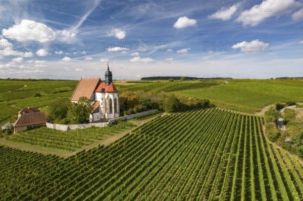 The pilgrimage church Maria im Weingarten and vineyards near Volkach seen from the air, Lower