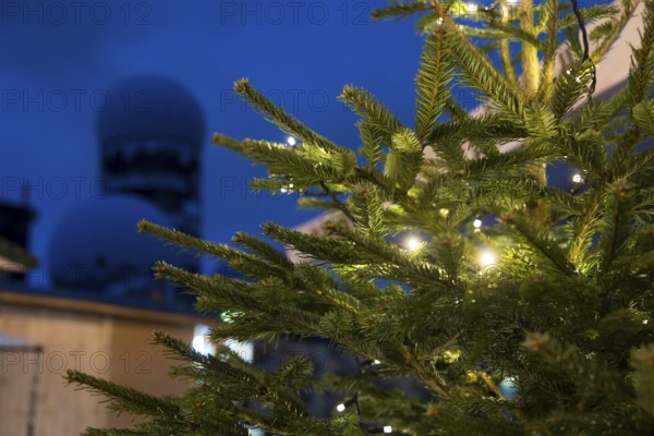 A Christmas tree at the Christmas market in front of the former listening station on the