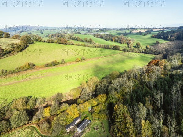 Fields and Farms over Skenfrith Castle from a drone, Monmouthshire, Wales, England, United Kingdom,
