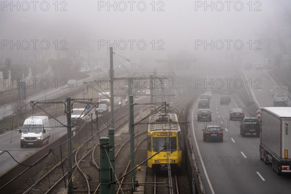 Dense fog, with visibility sometimes less than 100 metres, A40 motorway, city passage in Essen,