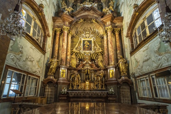 Altar of the baroque parish church Mariahilfer Kirche in Vienna, Austria, Europe