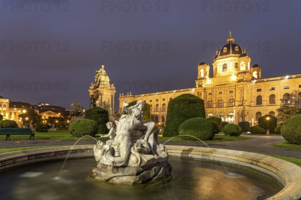 Fountain on Maria-Theresien-Platz and the Natural History Museum in Vienna at dusk, Austria, Europe
