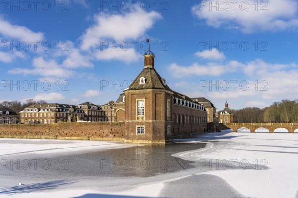The snow-covered Nordkirchen Castle in winter, Nordkirchen, Münsterland, North Rhine-Westphalia,