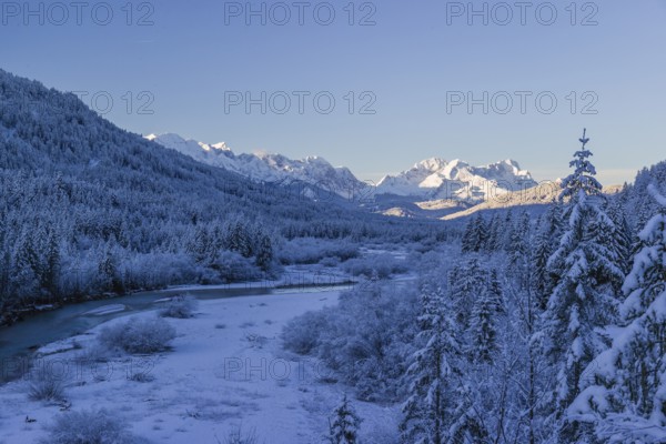 Isar valley in winter at temperatures of minus 18 degrees Celsius. Snow covered landscape with the