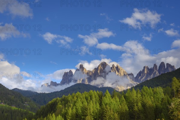 View of the partly cloudy Geisler group, Dolomites, Geisler group, Peitlerkofel group, St.