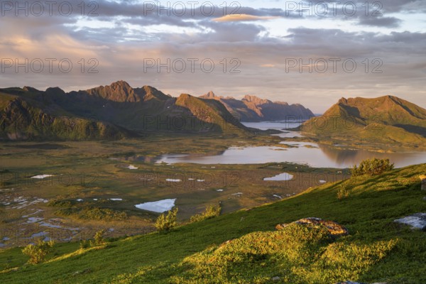 View of the coast and mountains from Mount Hoven, Gimsoy, Lofoten, Norway, Europe