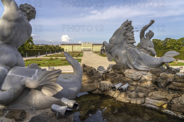 View through the Neptune Fountain to Schönbrunn Park and Palace, UNESCO World Heritage Site in