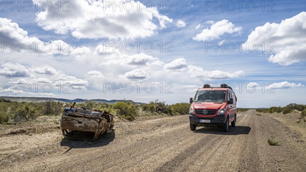 Car wreck along the road near Estancia la Maciega, Chubut, Argentina, South America