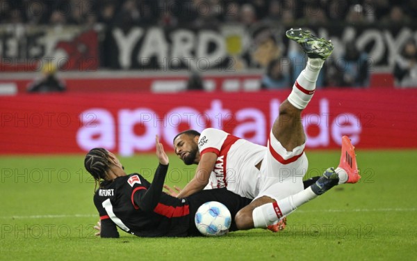 tackle, action, foul, Josha Vagnoman VfB Stuttgart (04) v Hugo Ekitike Eintracht Frankfurt SGE (11)