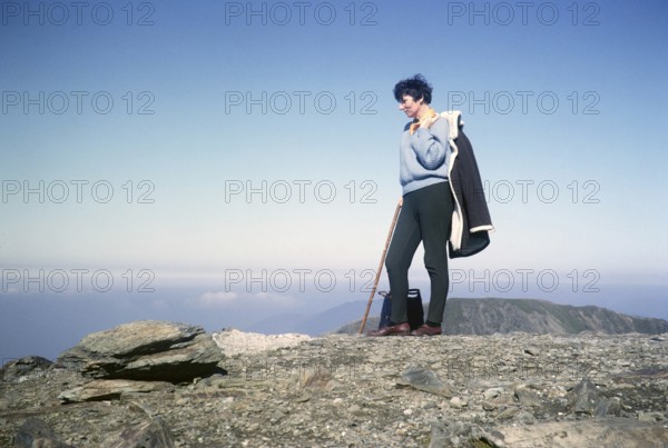 Woman walking on the summit of Mount Snowdon, Snowdonia, North Wales, Great Britain 1966