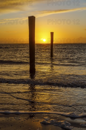Intense sunset on the west beach of Norderney, Lower Saxony, Germany, Europe