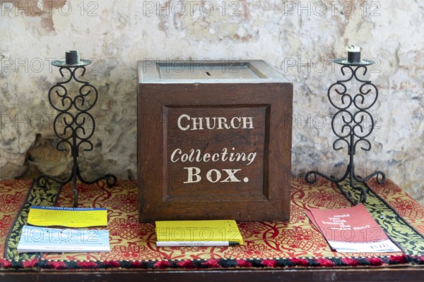 Church collecting box, Framsden church, Suffolk, England, UK