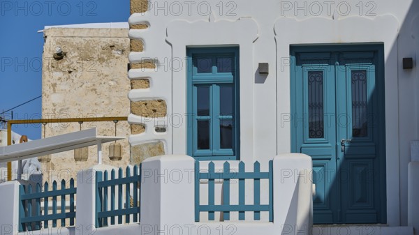White building with turquoise door and traditional design, Chora, Astypalea, Dodecanese, Greek