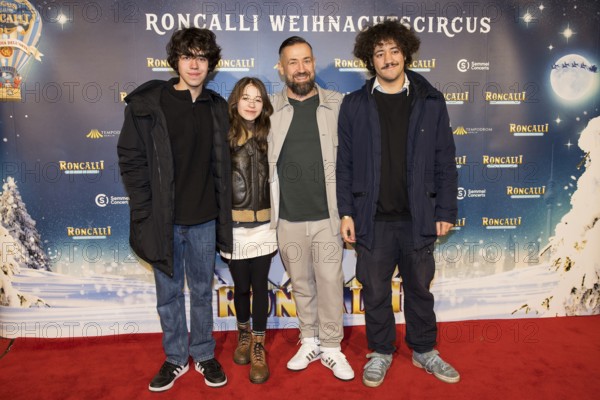Citizen Lars Dietrich with his children Milo, Mavi and Sean at the premiere of the 20th Original
