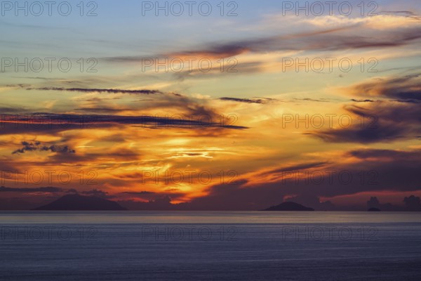Sunset over Aeolian Islands from Nicotera, Aeolus, Sicily, Tyrrhenian Sea, Italy, Europe