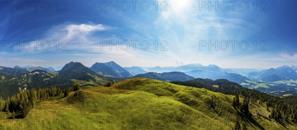 Drone shot, at the summit of the Taborberg with a view of the Osterhorn group and Dachstein massif,