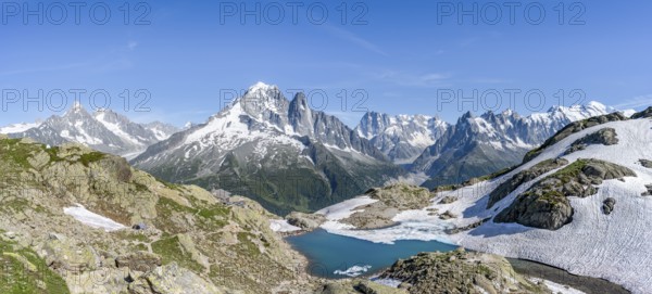 Mountain landscape with mountain lake Lac Blanc, mountain peaks, Aiguille Verte, Grandes Jorasses,