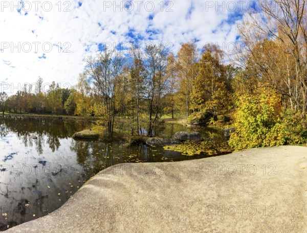 Fish pond with granite rocks in the Blockheide nature park Park near Gmünd, Waldviertel, Lower