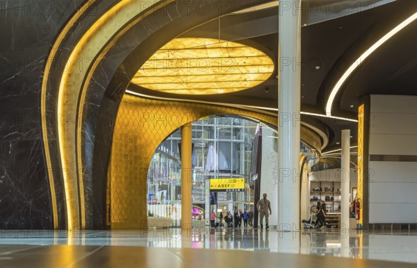 Abu Dhabi Airport, Zayed International Airport with passengers. Duty free shop. The new Terminal A