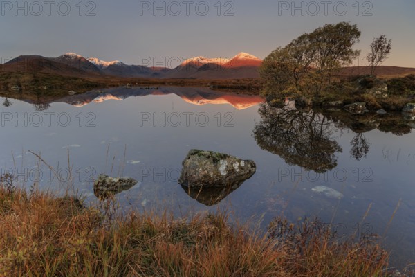 Mountains reflected in lake, morning light, morning mood, still, autumn, snowy, Lochan na