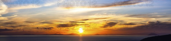 Panorama of Sunset over Aeolian Islands and Stromboli Volcano from Nicotera, Aeolus, Sicily,