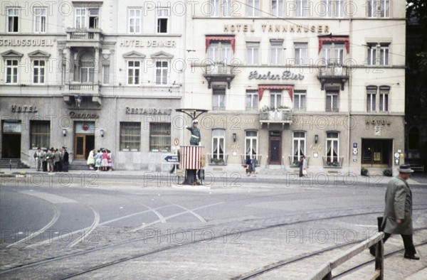 Traffic policeman on the street in front of a hotel, Bergheimer Straße, Heidelberg,