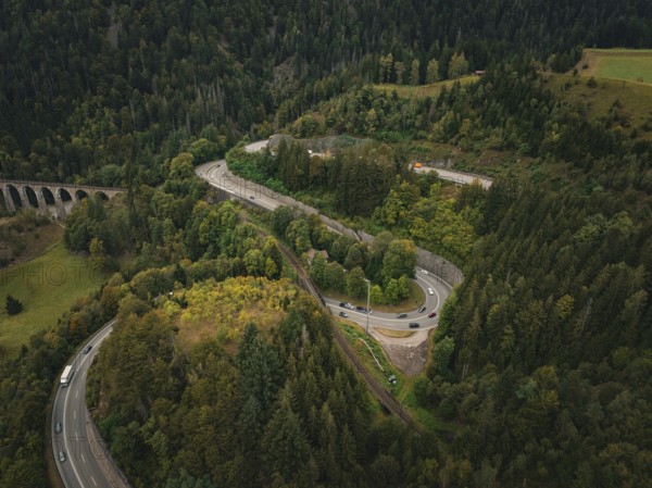 Winding road through dense forest in serpentines, Ravenna Gorge, Black Forest, Germany, Europe