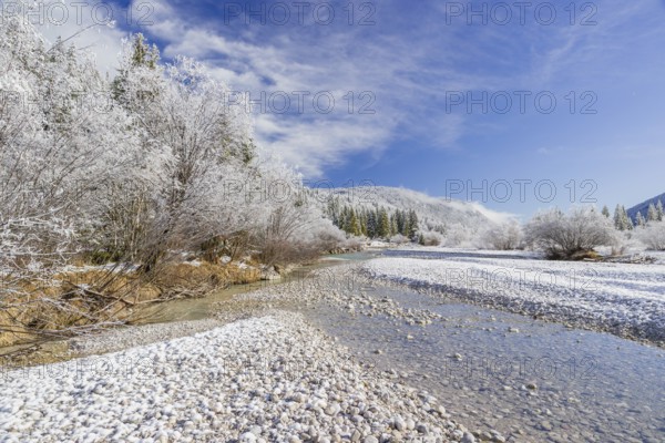 Isar valley in winter at temperatures of minus 18 degrees Celsius. Snow covered landscape with the