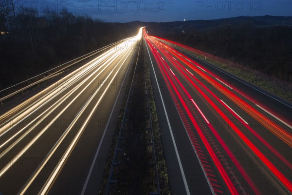 A7 Motorway, Autobahn, beside Kassel at night with light trails from the traffic headlights and