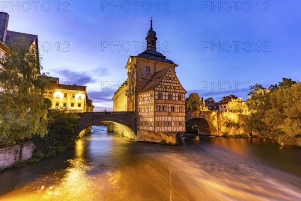 The Old Town Hall in the river Regnitz at dusk, Old Town of Bamberg, Upper Franconia, Bavaria,