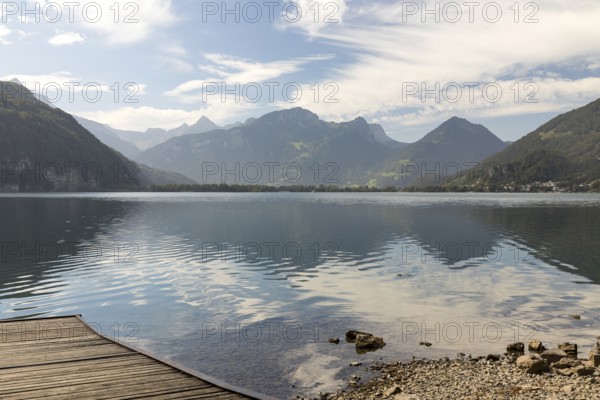 Lake Walen with jetty and mountain panorama in the west, Betlis bathing beach, Weesen, St. Gallen,