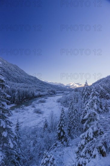 Isar valley in winter at temperatures of minus 18 degrees Celsius. Snow covered landscape with the