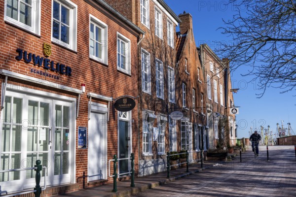 The fishing village of Greetsiel, municipality of Krummhörn, historic houses at the fishing
