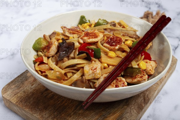 Fried noodles with chicken meat and vegetables, Bami Goreng, Indonesian dish, no people