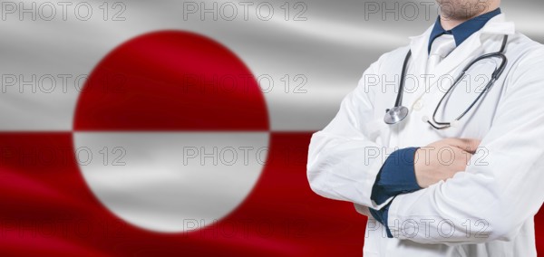Greenland Health Care concept. Male doctor on Greenland flag. Doctor with crossed arms on Greenland